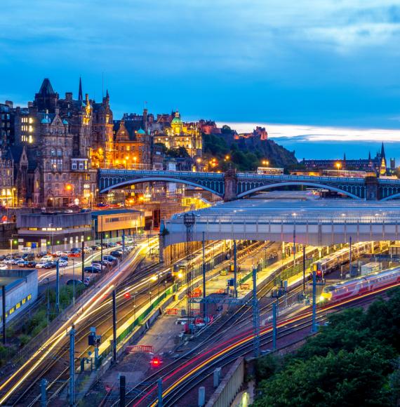 Night view of waverley station in edinburgh, scotland, via Istock 