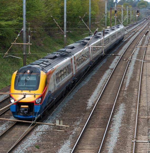 British East Midlands train in motion on the railway, via Istock 
