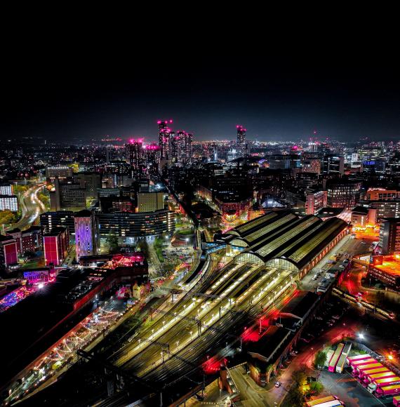 Manchester Piccadilly at night, via Istock 