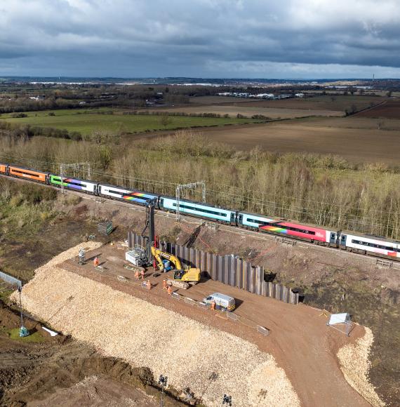 Blisworth earthworks drone shot with Avanti Progress Train passing by - Credit Network Rail 