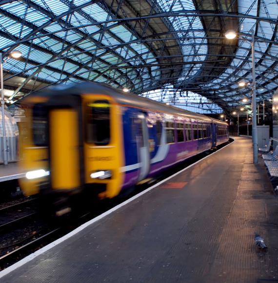 Train passing through station in Liverpool