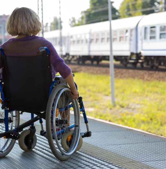 Female rail user in wheelchair