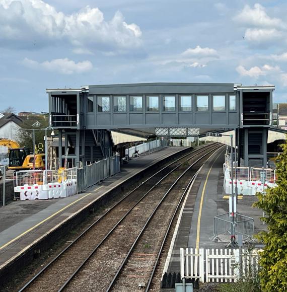 Bridge span is installed at Llanelli station as part of construction of accessible footbridge