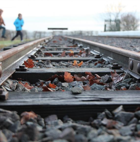 Young children near railway lines