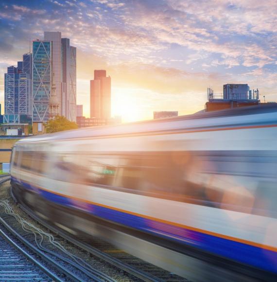 Overground Train approaching London skyline