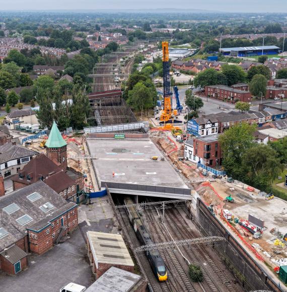 Drone image of first trains running under new Greek Street railway bridge