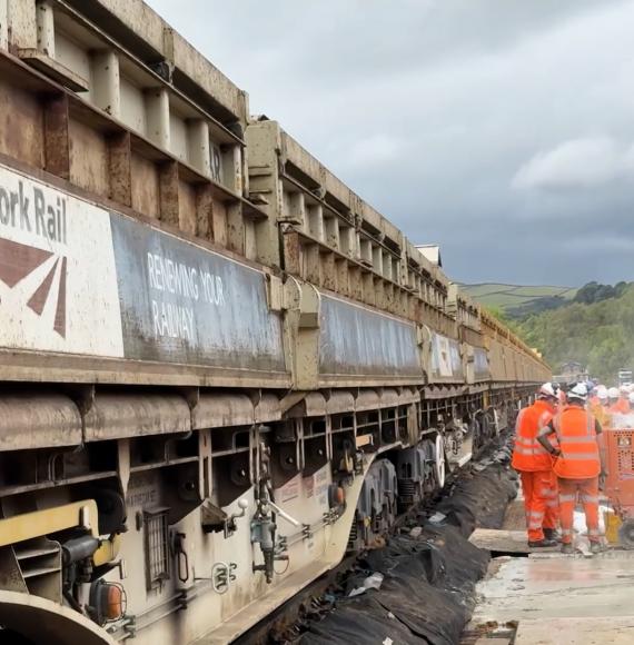 Engineering Train travelling over viaduct