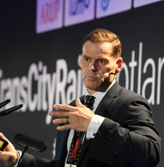Ross Moran speaking at TransCityRail Scotland 2025