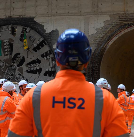 Workers watching the breakthrough