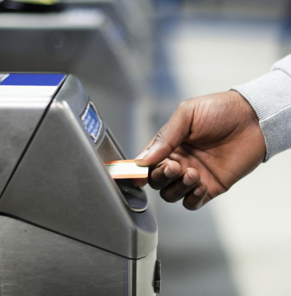 Man using train ticket