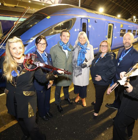 Team celebrating launch of new Lumo Service