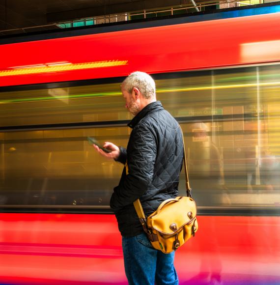 Man near a fast train