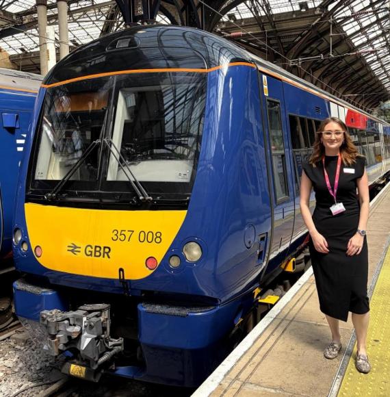 Alice Shimali and a train