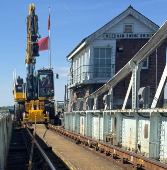 A road rail vehicle working on the bridge