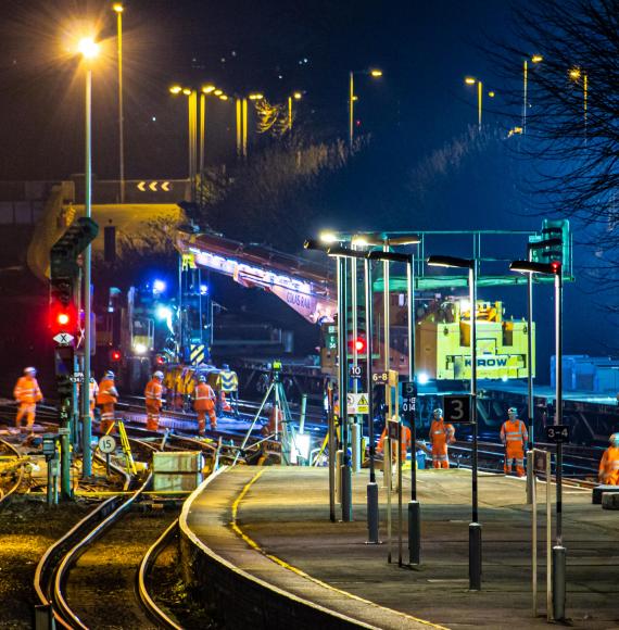 Rail workers at night