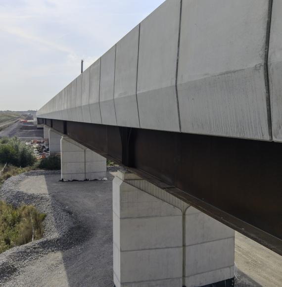 Close up of the weathering steel beam and concrete parapets of the Westbury viaduct October 2026