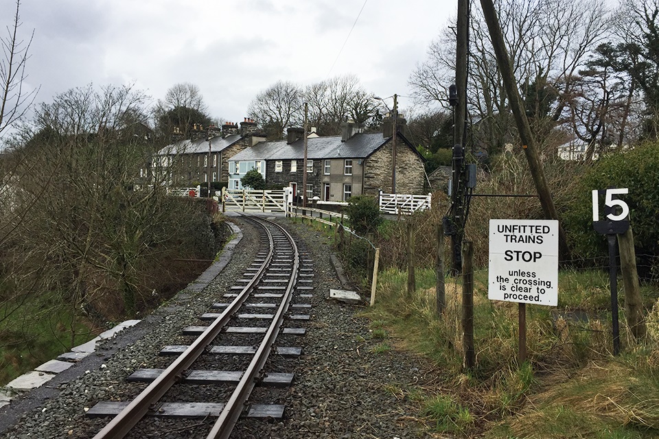 Train ‘fortunate’ to avoid collision after breaking through barriers at a level crossing, RAIB reports