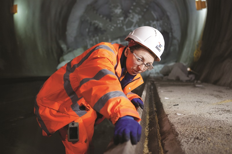Crossrail Engineer Regina Tumblepot inspects a Crossrail tunnel at the new Whitechapel station in east London 120653