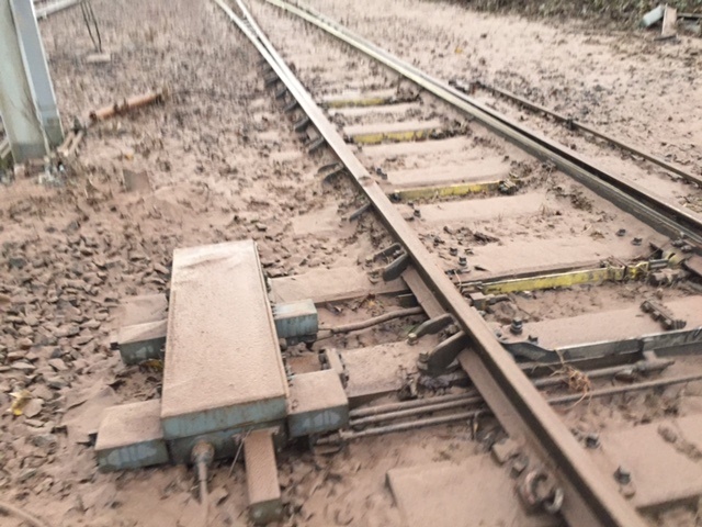 Mud covered and damaged track north of Carlisle Mud covered and damaged track north of Carlisle