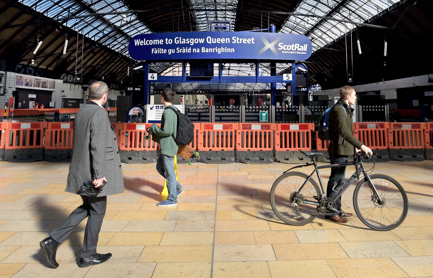 Engineers start breaking up track as Glasgow Queen Street closes for 20-week renovation